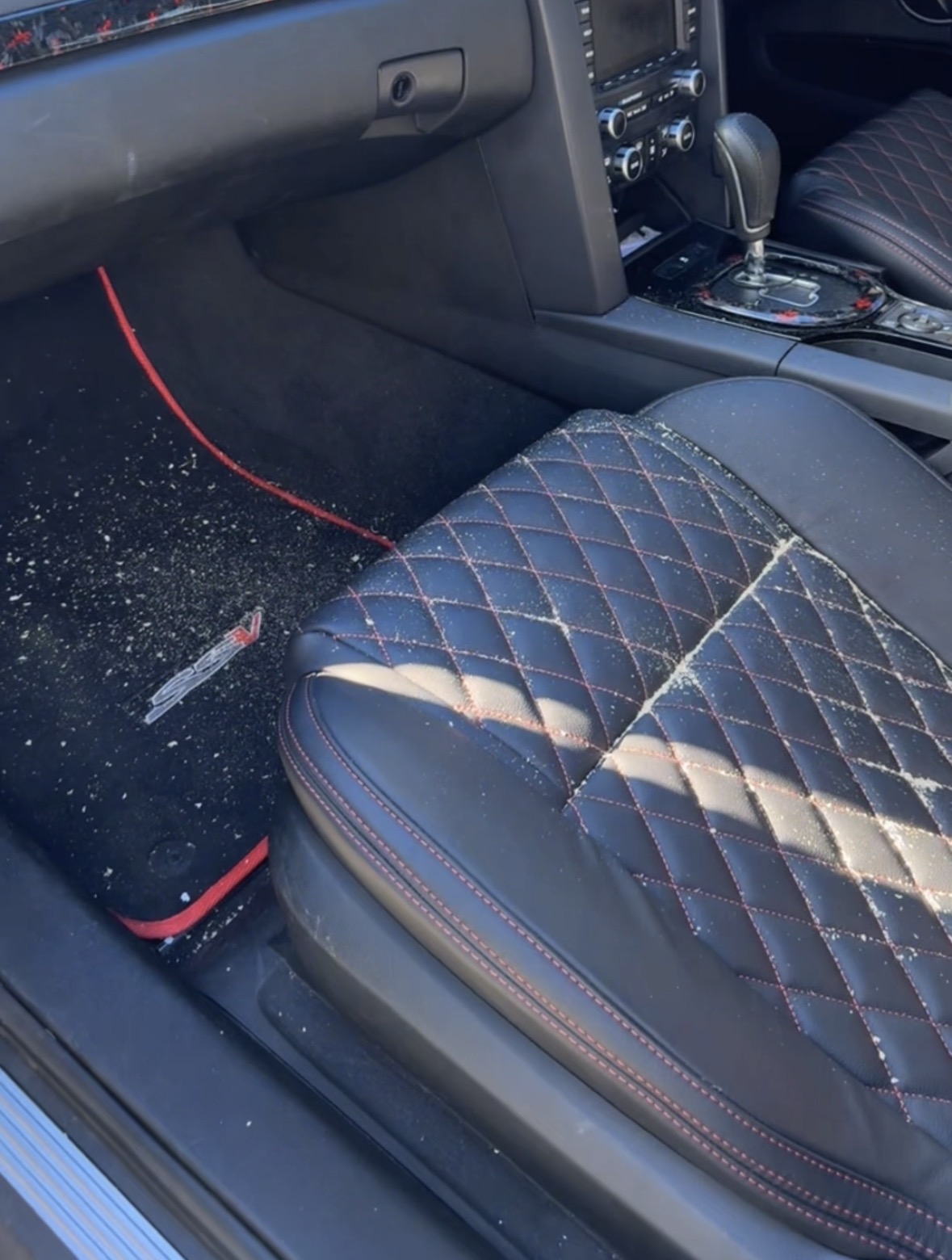 Interior — leather & carpet detail before